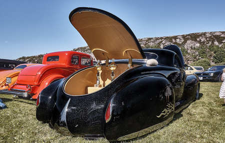 Froya island, Norway - 24 July 2016: Back of the classic Shadow car in black at cars show in norwegian Islanders Classic Car Club - Kysttreffet 2016.

Island in the Atlantic Ocean and Norwegian fjord.のeditorial素材