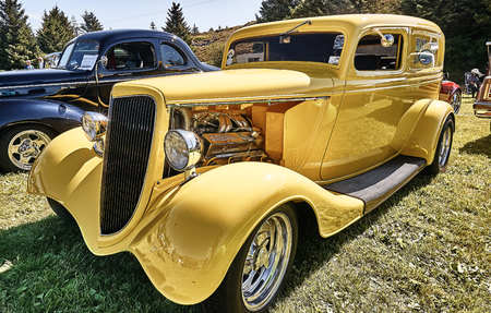 Froya island, Norway - 24 July 2016: Side of the classic car in yellow  at cars show in norwegian...