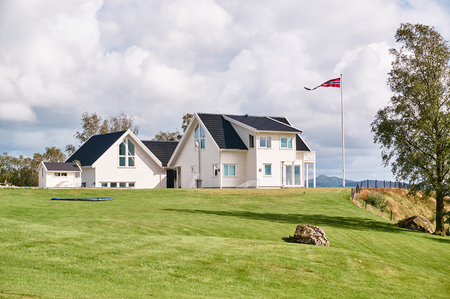Fogn, Norway - July 17, 2015: Small Norwegian island  - Fogn. Norwegian fjords Bokna Fjord landscape located in Rogaland county. Around Stavanger. Windy day.のeditorial素材