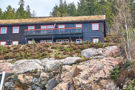 Gautefall, Norway - May 2, 2015:  Residential building with a green roof, for rent. Green roof. Early spring.のeditorial素材