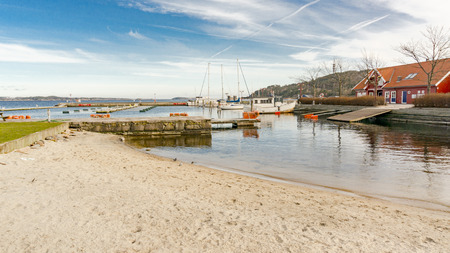 Kristiansand, Norway - June 4, 2015: Sandy beach Bystranda is a popular swimming spot in the summer months, its location makes it unik.のeditorial素材
