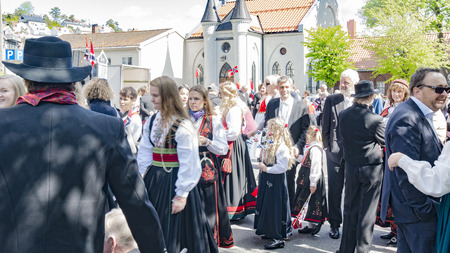 Kragero, Norway - May 17, 2015: National day in Norway. Norwegians at traditional celebration and parade.のeditorial素材