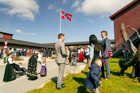 Filan Hitra, Norway - May 17, 2017: Celebration of Norway's Constitution Day. People in the Norwegian national costumes with embroidery, silver jewelry. Traditional celebration street parade.のeditorial素材