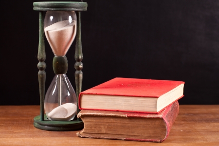 books and hourglass の写真素材