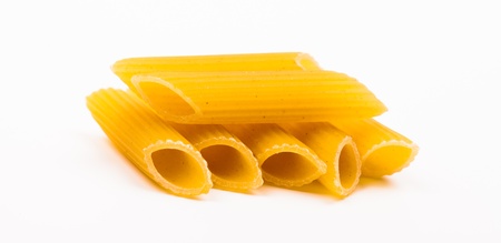 pasta pipes on white background