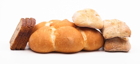 assortment of baked bread on white background の写真素材