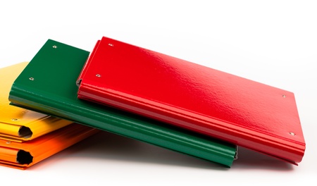 colorful office folders isolated on whiteの写真素材