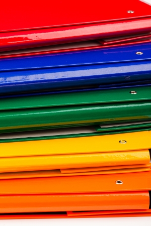 colorful office folders isolated on white