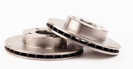 auto brake discs isolated on whiteの写真素材