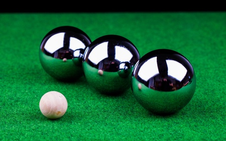 steel balls on green surface