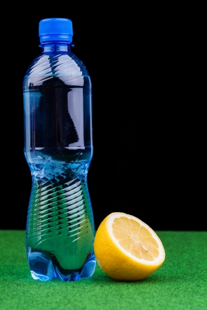 bottle of water   on black backgroundの写真素材