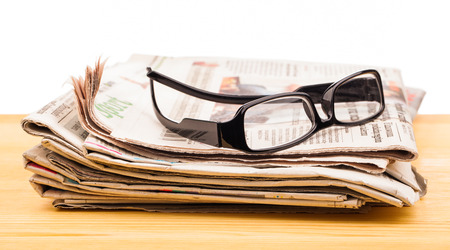newspaper magazines on tableの写真素材
