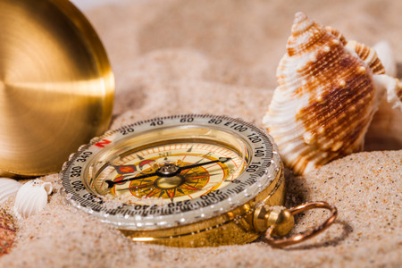 compass on sandの写真素材