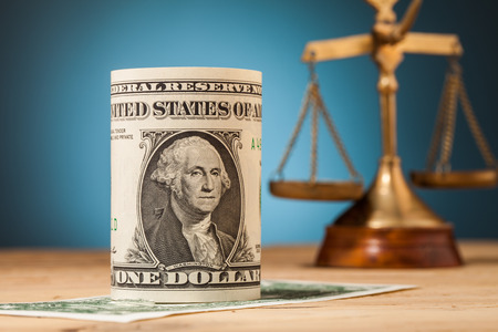 dollar money closeup on wooden table and blue backgroundの写真素材
