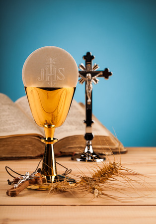 Chrystian holy communion composition on wooden tableの写真素材