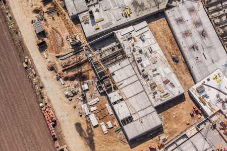 aerial view of building site and harvest fields in Poland
