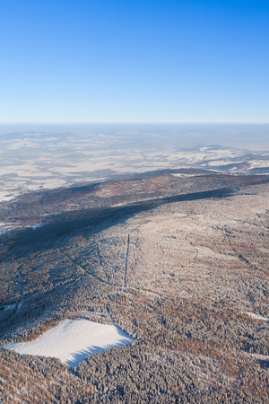 aerial view of the forest in winter time in Poland in Karkonosze mountainsの写真素材
