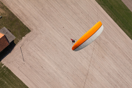 aerial view of paramotor flying over the fields in Poland