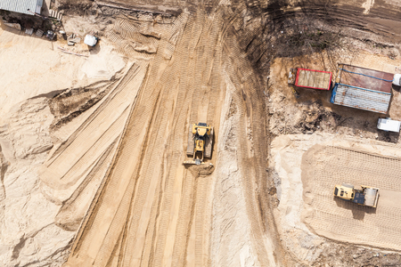 Aerial view of the working earth mover in Polandの写真素材