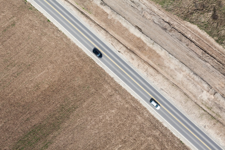 aerial view of  over the road and harvest fields in Polandの写真素材