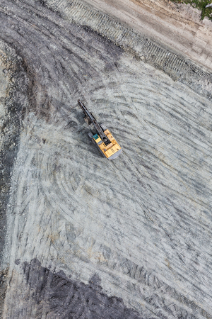 Aerial view of the working earth mover in Polandの写真素材