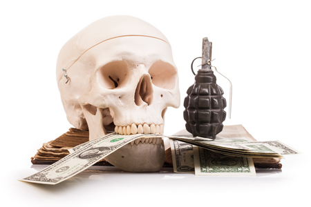 human scull  and holy book isolated on white backgroundの写真素材
