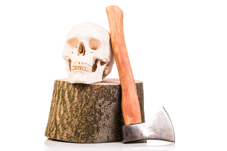 human skull wooden  log and axe isolated on whiteの写真素材