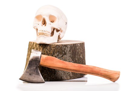 human skull wooden  log and axe isolated on whiteの写真素材