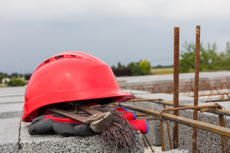 red helmet on the building siteの写真素材