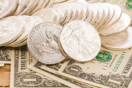American coins on the background of dollar bills. Shallow depth of fieldの写真素材