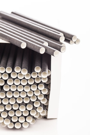 drinking paper straw isolated on whiteの写真素材
