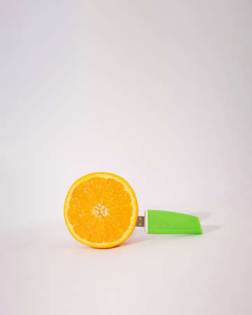 concept creative orange with usb device in it.colorful abstract designの写真素材