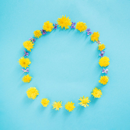 sunny spring minimal flat lay concept.idea of copy space on a blue background.art idea designの写真素材