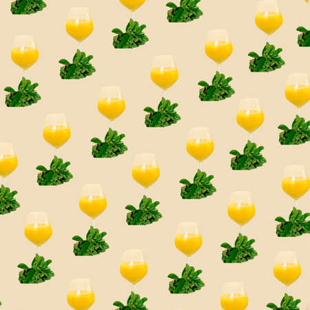 vibrant yellow cold drink in a glass.summer pattern aesthetic.tropic idea.beige backgroundの写真素材