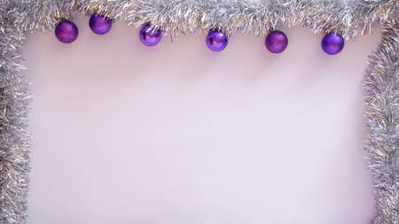 Christmas card frame with shiny ornaments.Copy space holiday trendの写真素材