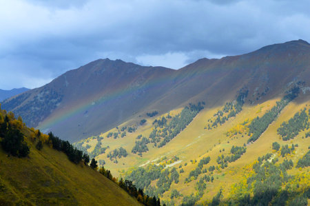 Rainbow in the mountains, autumn 2015, Arkhyz, Karachay-Cherkessia, Russiaの写真素材