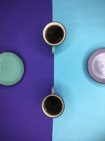 Ceramic cups on two tone blueの写真素材