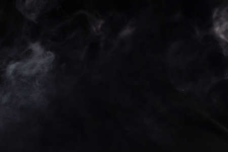 cold latte with ice in a tall glass on a gray background. High keyの写真素材