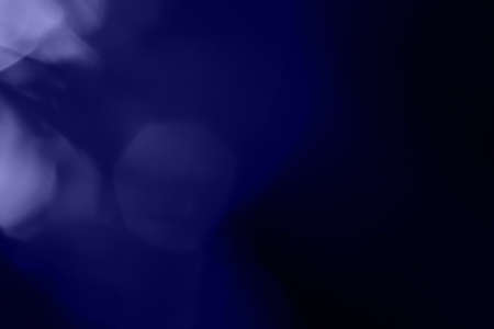 bokeh very peri light on black background overlayの写真素材