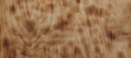 Wooden background with dark and light brown spots