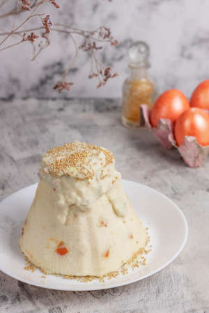 Cottage cheese cake with dried apricots is on the table. high keyの写真素材