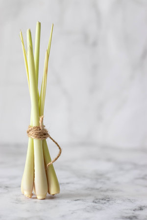Fresh lemongrass rope. light background. vertical photoの写真素材