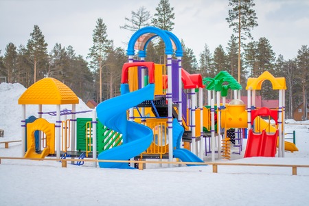 Colorful playground in the winterの写真素材