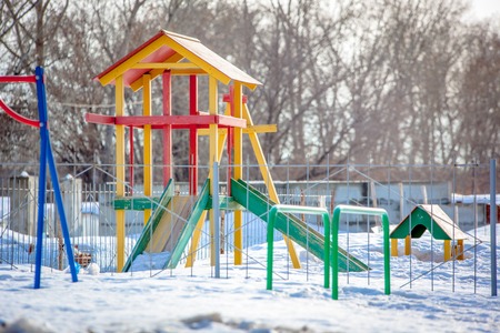 Chidrens playground in winter outdoorの写真素材