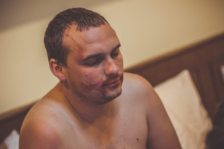 Man in Halloween dressed as a jokerの写真素材