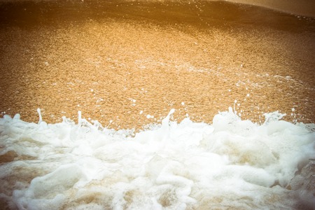 Sand beach and waveの写真素材