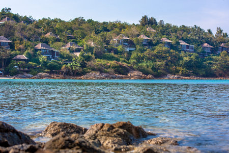 Seaside village overlooking the ocean on the island in Thailandの写真素材