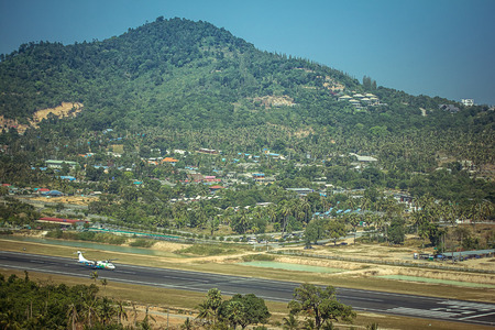 landing strip of the airport with airplane in the islandの写真素材