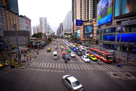 Traffic along a busy road and city landscape. Bangkok. Thailand