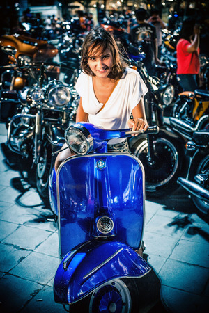 Young sexy beautiful woman are posing at Koh Samui bikes show in Thailand. Motorcycles exhibited At motorcycle Showのeditorial素材